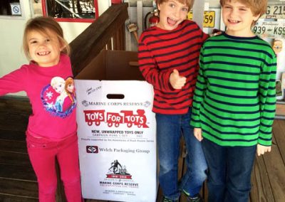 RUSH REVERE IS PROUD TO SPONSOR TOYS FOR TOTS ANNUALLY